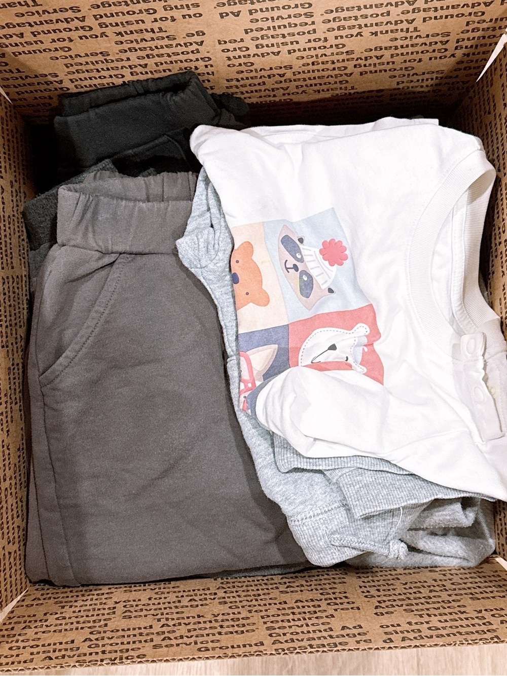 Random kids clothes and toys mystery box